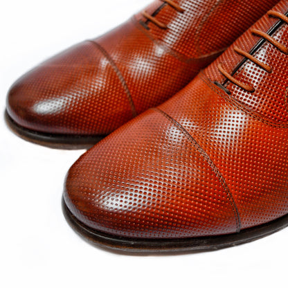 Elegant Oxfords in perforated leather