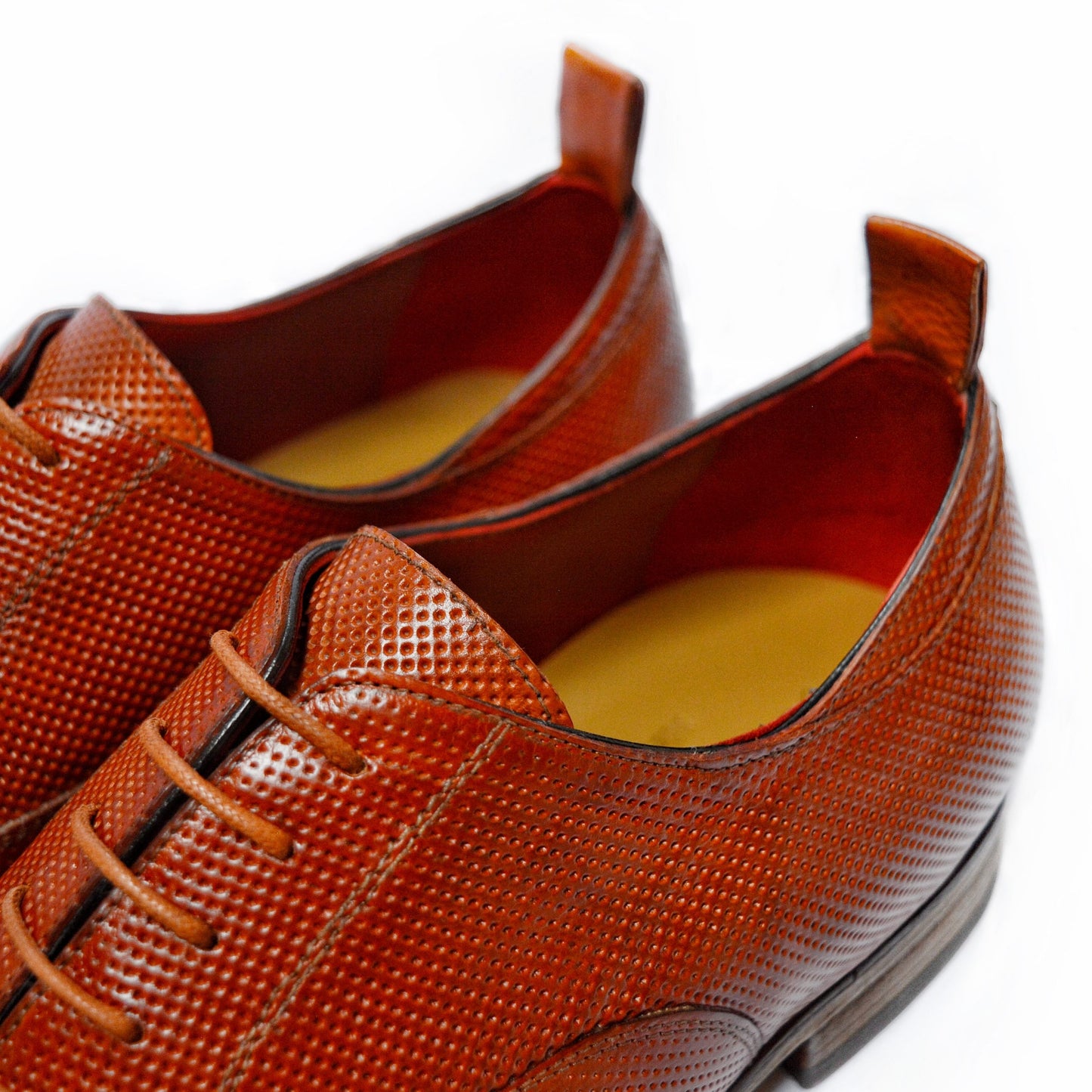 Elegant Oxfords in perforated leather